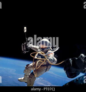 Astronaut floating in space wearing a spacesuit. He is attached to the International Space Station. This image is a handout from NASA to be used ONLY 