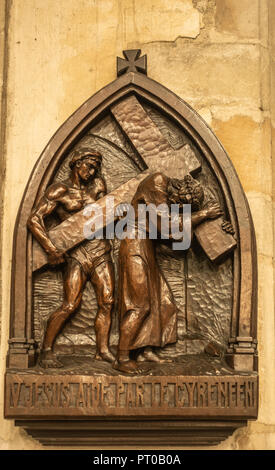 Dunkerque, France - September 16, 2018: Inside Saint Eloi Church in Dunkirk. closeup of fifth Station of the cross wherein Simon of Cyrene helps carry Stock Photo