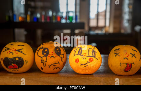 Oranges with painted feelings Stock Photo