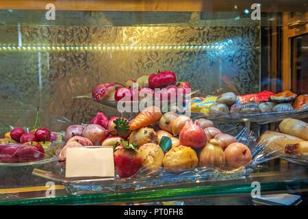Baking with marzipan in the form of different fruits and fish. Typical Sicilian. Stock Photo