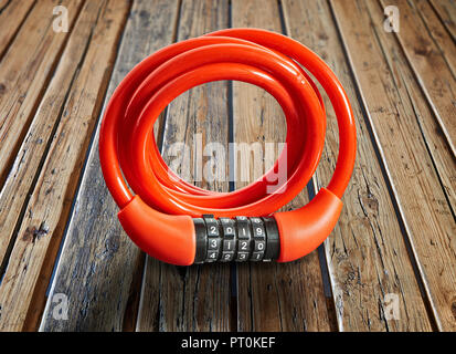 Security system lock for bike with 2019 as password combination on textured wooden table Stock Photo