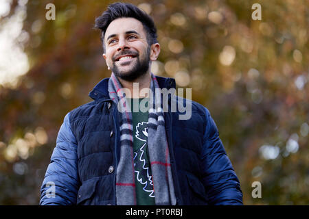Man walking outdoors Stock Photo