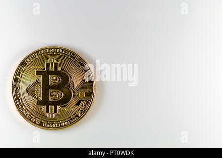 Bitcoin token isolated on white background. Cryptocurrency concept with copy space. Stock Photo