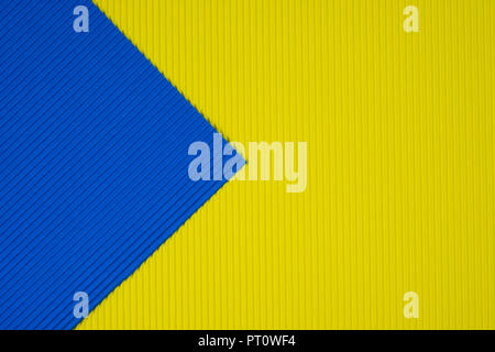 Blue and yellow corrugated paper texture, use for background. vivid colour with copy space for add text or object. Stock Photo