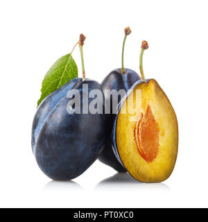 Three ripe fruit prunes isolated on white background Stock Photo
