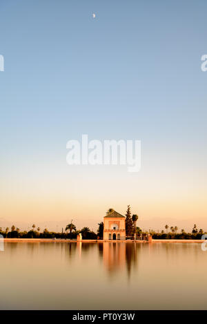 The Menara gardens are botanical gardens located to the west of Marrakech, Morocco, near the Atlas Mountains. Stock Photo