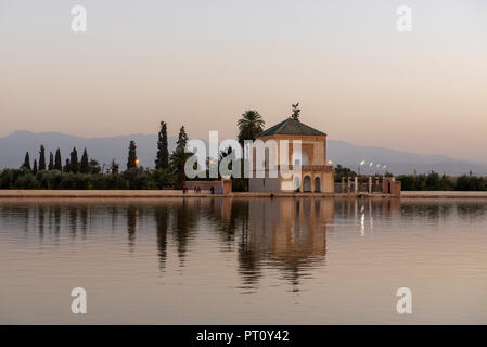 The Menara gardens are botanical gardens located to the west of Marrakech, Morocco, near the Atlas Mountains. Stock Photo