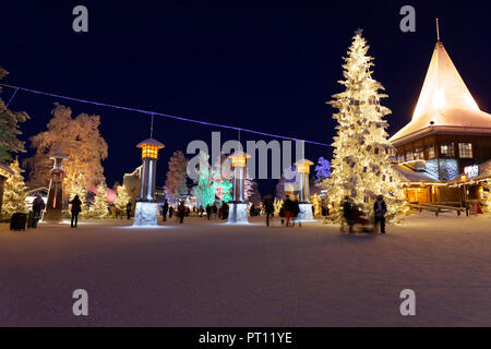 ROVANIEMI, FINLAND - December 16, 2016: Santa Claus holiday village and arctic circle line in Rovanimie. Finland. Stock Photo