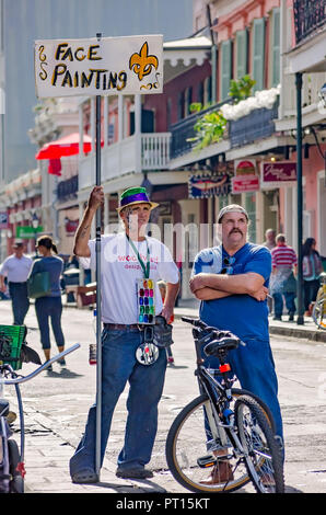 Face painters wait for customers in the Frenh Quarter, Nov. 15, 2015, in New Orleans, Louisiana. (Photo by Carmen K. Sisson/Cloudybright) Stock Photo