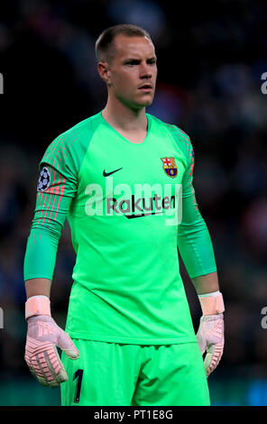 Barcelona's goalkeeper Marc-Andre ter Stegen (L) touches the goal net ...