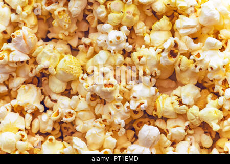 Some homemade Popcorn as detailed close-up shot, Yellow sweet popcorn. Pattern. Stock Photo