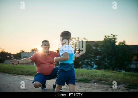 Grandfather and grandson spending time together Stock Photo
