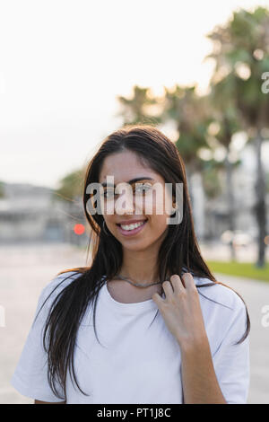 Portrait of a confident young woman in the city Stock Photo
