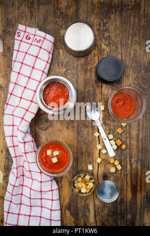 Tomato soup in thermos flask, croutons Stock Photo