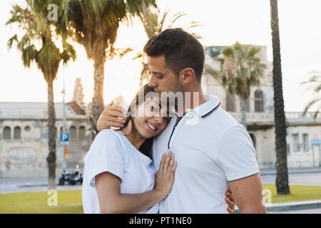 Young woman leaning on shoulder of her boyfriend Stock Photo