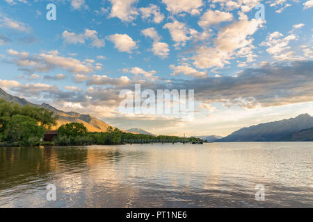 Clouds in the sky above Lake Wakatipu and the jetty, Glenorchy, Queenstown Lakes district, Otago region, South Island, New Zealand,