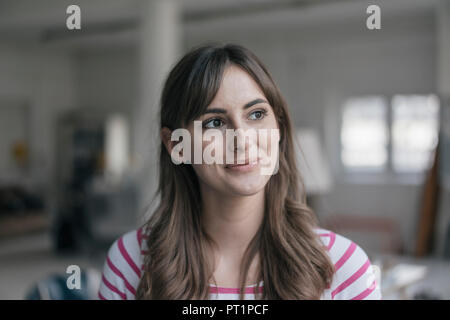 Portrait of a smiling, confident young woman Stock Photo