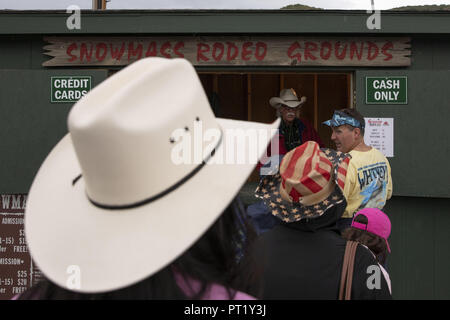 Colorado, USA. 22nd Aug, 2018. Rodeo spectators purchase tickets at the Snowmass Rodeo on August 22, 2018 in Snowmass, Colorado. Credit: Alex Edelman/ZUMA Wire/Alamy Live News Stock Photo