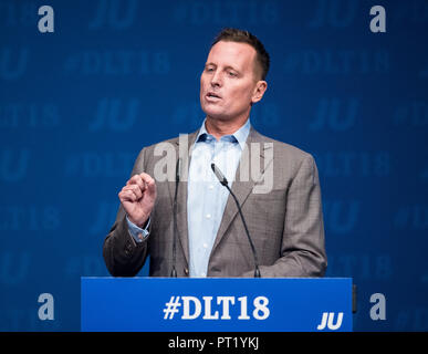 05 October 2018, Schleswig-Holstein, Kiel: Richard Grenell, US Ambassador to Germany, speaking during the Germany Day of the Young Union (JU). Grenell acknowledged the close relations between Germany and the USA, but at the same time reaffirmed the demands made by US President Trump to Germany and the EU. Photo: Daniel Bockwoldt/dpa Stock Photo