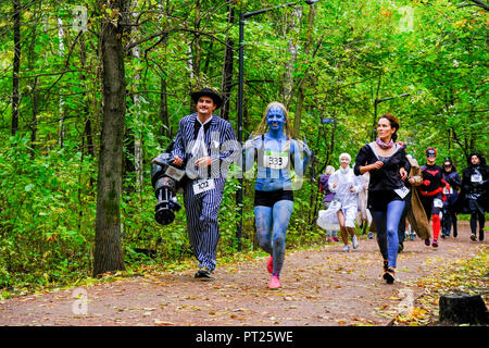 Moscow, Russia. 6 October 2018. Superheroes race was held in Sokolniki park in Moscow. More than 200 people dressed as comics superheroes have run in the park for 5 km. Credit: Marco Ciccolella/Alamy Live News Stock Photo