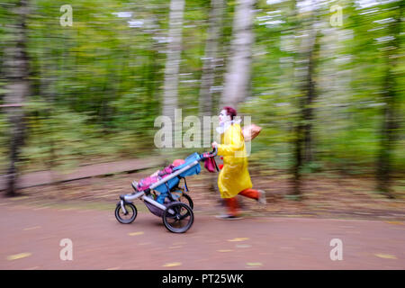 Moscow, Russia. 6 October 2018. Superheroes race was held in Sokolniki park in Moscow. More than 200 people dressed as comics superheroes have run in the park for 5 km. Credit: Marco Ciccolella/Alamy Live News Stock Photo