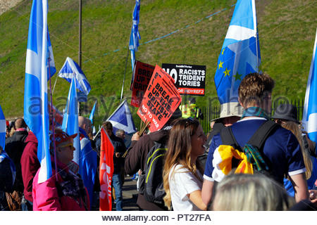 Edinburgh, United Kingdom. 6th October, 2018. Participants gathering in Johnston terrace before the start of the All Under One Banner (AUOB) march For Independence. All Under One Banner (AUOB) march For Independence, marching down the Royal Mile to the Scottish parliament for a rally in Holyrood Park. AUOB are a Pro-Independence organisation whose core aim is to march at regular intervals until Scotland is Free. They will host public processions in support of Scotland regaining Independence.    Credit: Craig Brown/Alamy Live News. Stock Photo