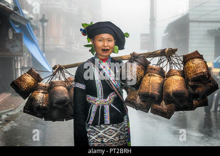 A tribal woman belonging to Lu tribe in Sapa,Vietnam. Stock Photo
