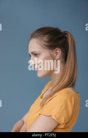 Portrait of a pretty woman, side view Stock Photo