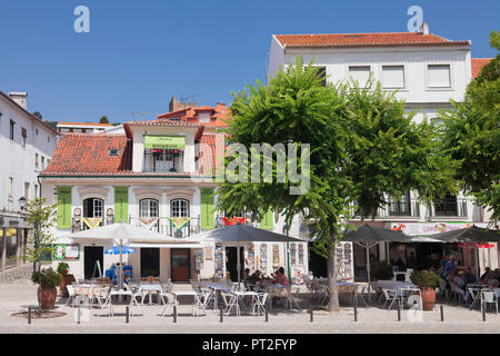 Street cafes at the Piazza in front of the Santa Maria monastery, Alcobaca, Estremadura, Leira, Portugal Stock Photo