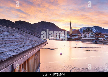 Winter sunrise in Rottach-Egern with the frozen Tegernsee Lake, District Miesbach, Upper Bavaria, Germany, Europe Stock Photo