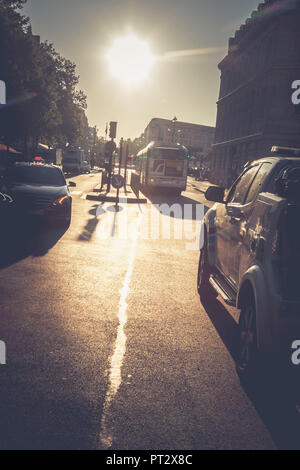 Backlight shot in Paris - street scene with traffic lights, cars and bus, Paris, France, Europe, Stock Photo
