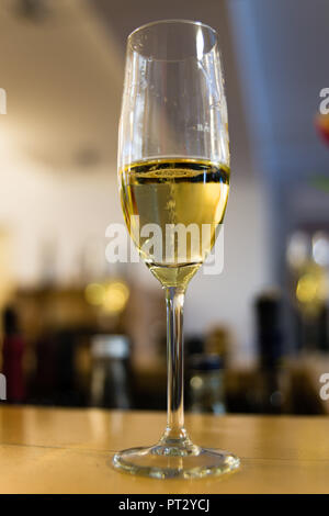 Champagne glass at the bar Stock Photo