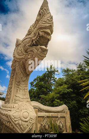 Beautiful naga head sculpture on the stairs leading up the temple on the mountain Stock Photo