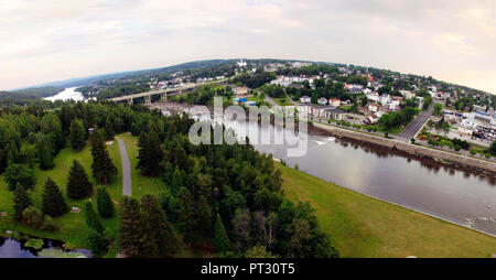Aerial view of harnessed river flowing through town, Alma, Quebec, Canada, panorama fisheye effect Stock Photo