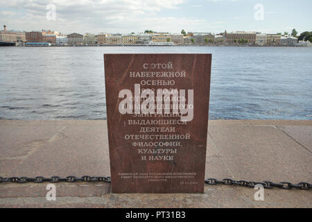 Commemorative sign marking the place from where the Philosophers' ships with Russian intellectuals were departed to exile from Bolshevik Russia in autumn 1922 on the embankment of the Neva River in Saint Petersburg, Russia. Text in Russian means: Prominent figures of Russian philosophy, culture and science were expelled to emigration from this embankment in the autumn of 1922. The commemorative sign was installed by the Saint Petersburg Philosophic Society and unveiled on 15 November 2003. Stock Photo