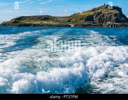 Speeding boat wake and view of Fidra Island, Firth of Forth, East Lothian, Scotland, UK Stock Photo