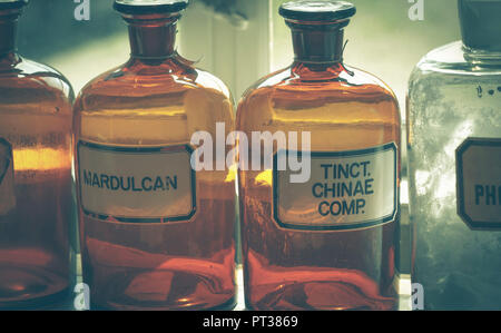 old pharmacy - drugstore, alchemy, naturopathy, glass bottles Stock Photo