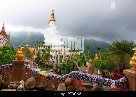 View of magnificent white sitting Buddhas from the inside of Pha Sorn Kaew, Khao Kor, Phetchabun, Thailand. Stock Photo