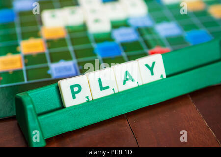 Bangkok, Thailand - September 19, 2018 : Play word made from Scrabble's letter tiles. Stock Photo