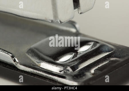 new stapler for stapling papers on a table Stock Photo