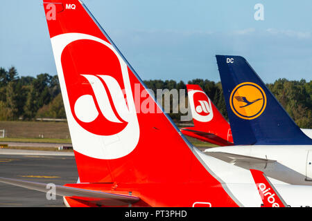 HAMBURG / GERMANY - SEPTEMBER 28, 2018: Airplane from Air Berlin and Lufthansa stands on airport gate in Hamburg Stock Photo