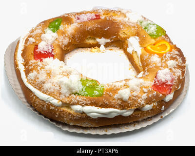 Roscon de reyes, typical Spanish dessert of Epiphany, isolated on white background Stock Photo