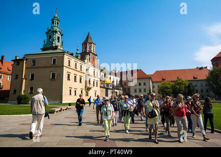 KRAKOW, POLAND - SEPTEMBER 2, 2016. Tourists at  Wawel Royal Castle, top attraction in Krakow, Poland. Stock Photo