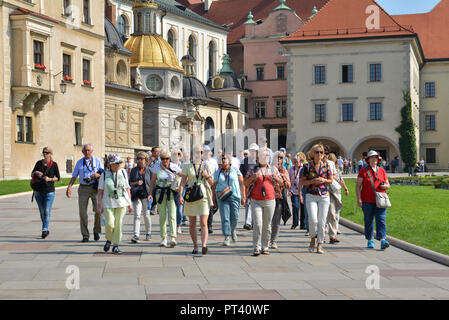 KRAKOW, POLAND - SEPTEMBER 2, 2016. Tourists at  Wawel Royal Castle, top attraction in Krakow, Poland. Stock Photo