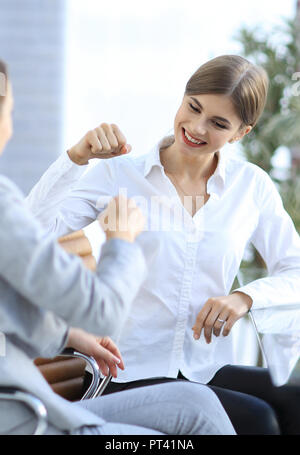 members of the business team happy to the results and giving a high five Stock Photo