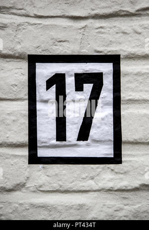 Number seventeen information, odd number detail, address Stock Photo