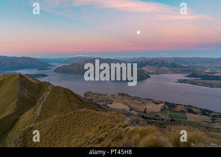 Moonlight over Lake Wanaka at sunset, Wanaka, Queenstown Lakes district, Otago region, South Island, New Zealand,