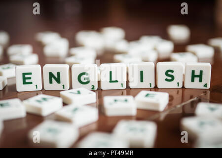 Bangkok, Thailand - September 19, 2018 : English word made from Scrabble's letter tiles. Stock Photo