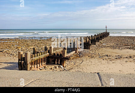 Beach with large timber breakwater in North Norfolk at West Runton, Norfolk, England, United Kingdom, Europe. Stock Photo