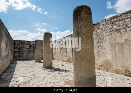 Stone columns in a central courtyard at Mitla archeological site Stock Photo